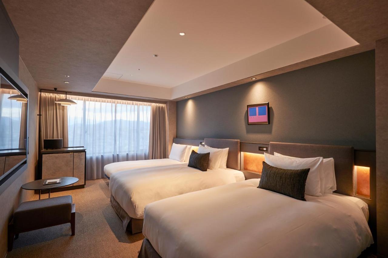 Deluxe Twin Room (with Extra Bed for 3 Adults)
