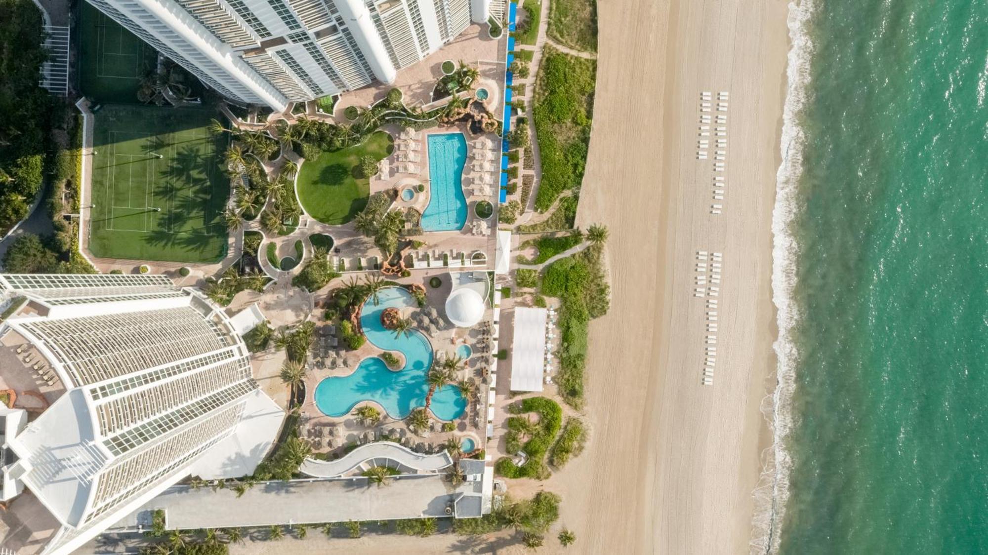 Deluxe Kamer met 2 Queensize Bedden - Aan de Oceaan