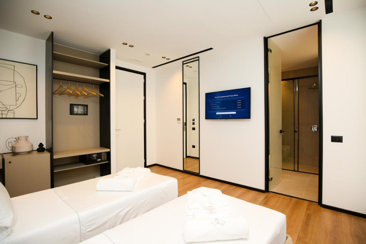 Double or Twin Room with Balcony and Side Sea View