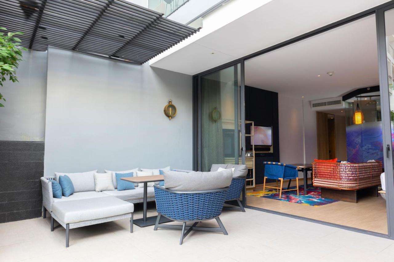 King Suite mit Terrassenzugang und Blick auf den Garten