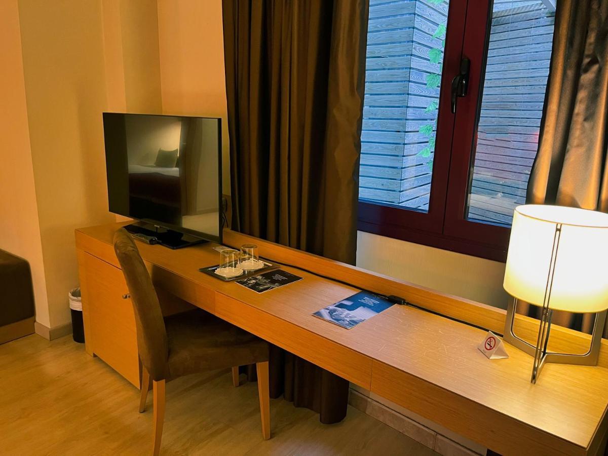 Chambre Triple Confort - Vue sur Intérieur