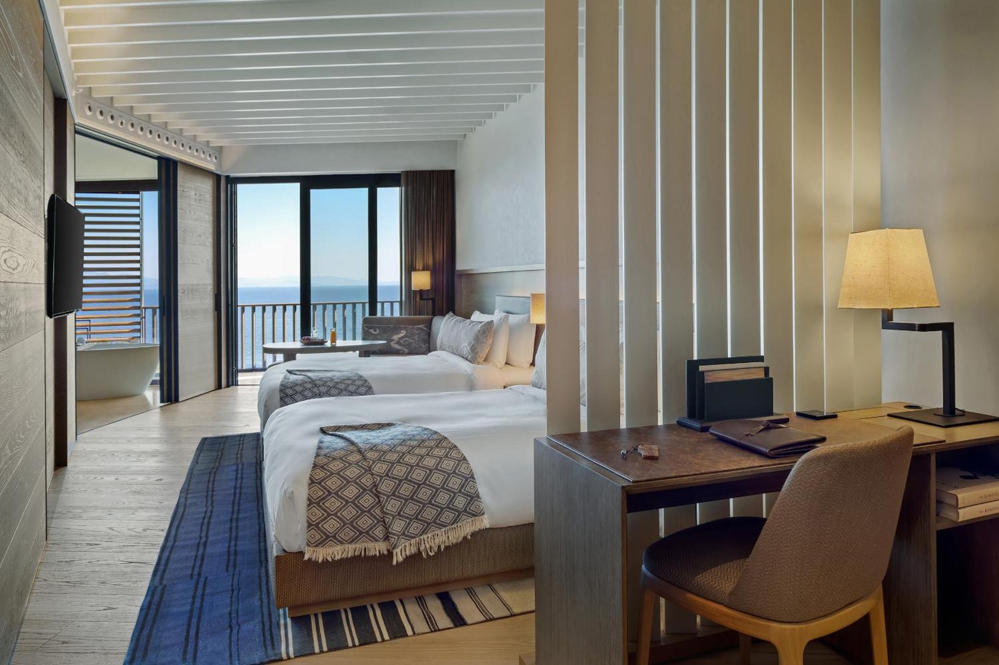 Luxe Tweepersoonskamer met 2 Bedden - Uitzicht op Zee