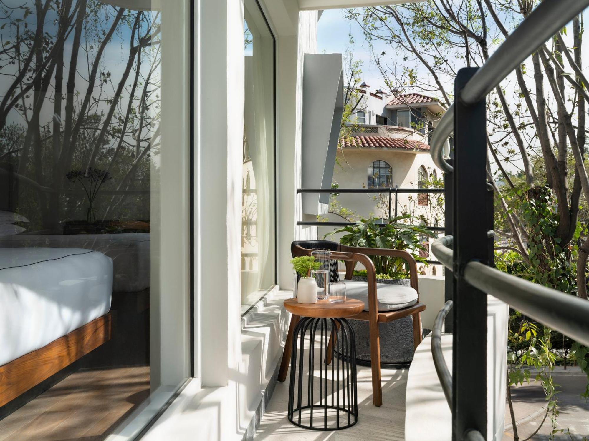 Premium Queen Room with Two Queen Beds and Balcony