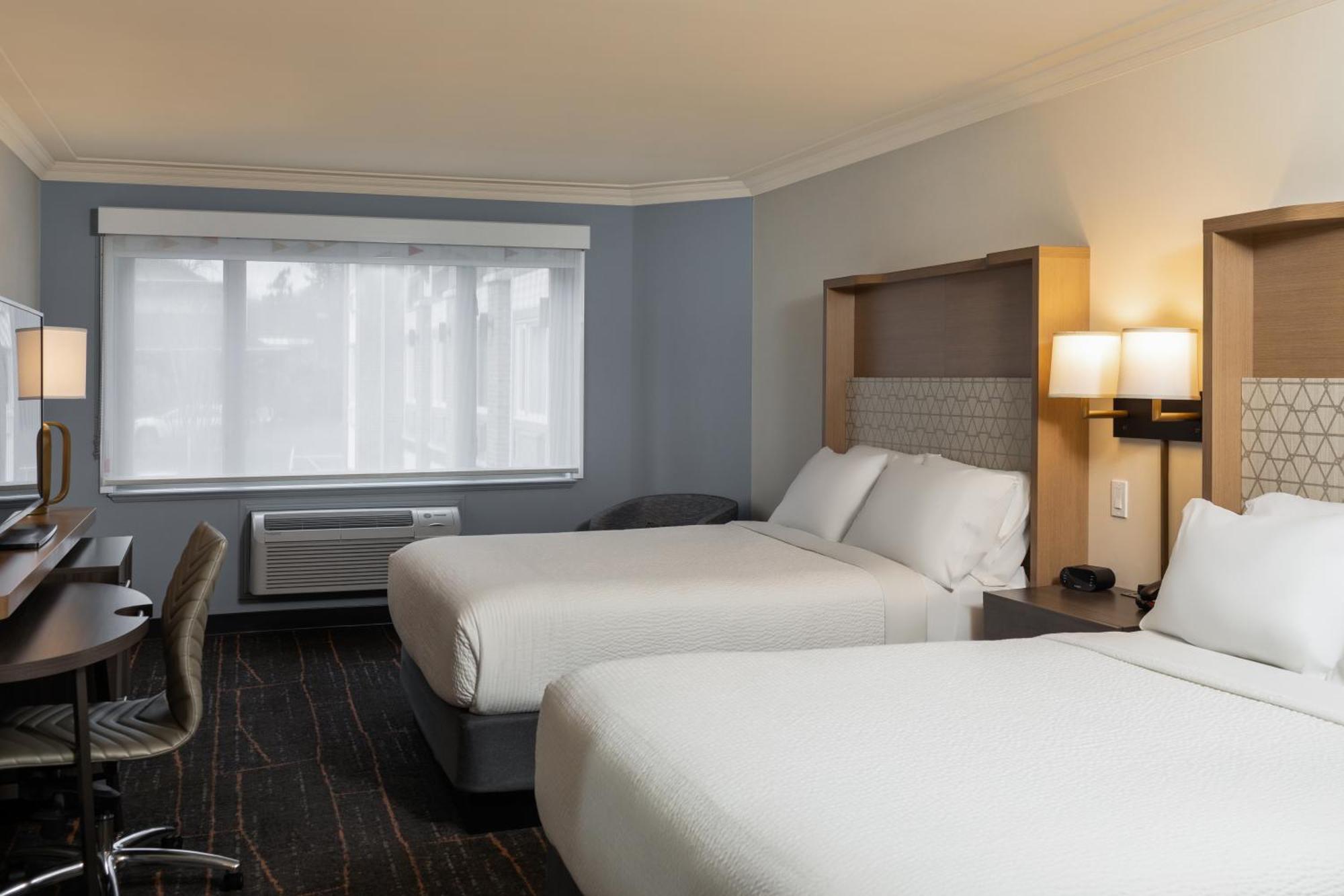 Standard Queen Room with Two Queen Beds and Pool View