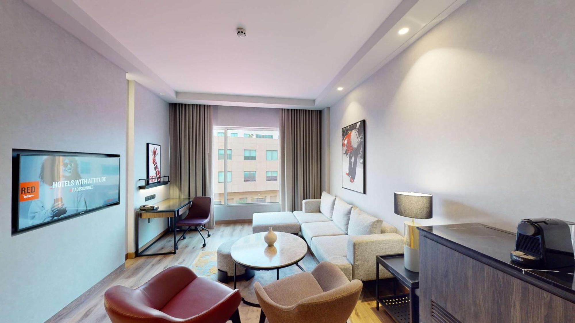 Junior Suite with King Bed and living room, 15% discount on Food & Soft beverage and Laundry.