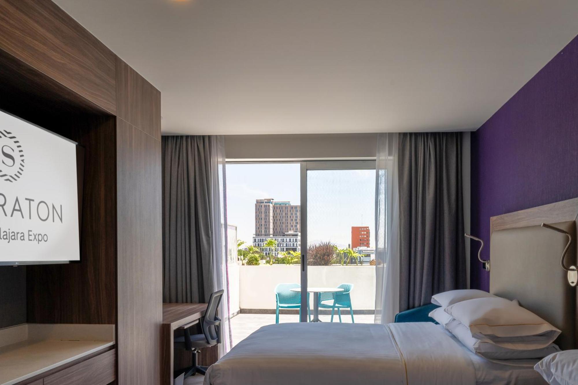 Habitación Deluxe con balcón y vistas a la ciudad - 2 camas grandes