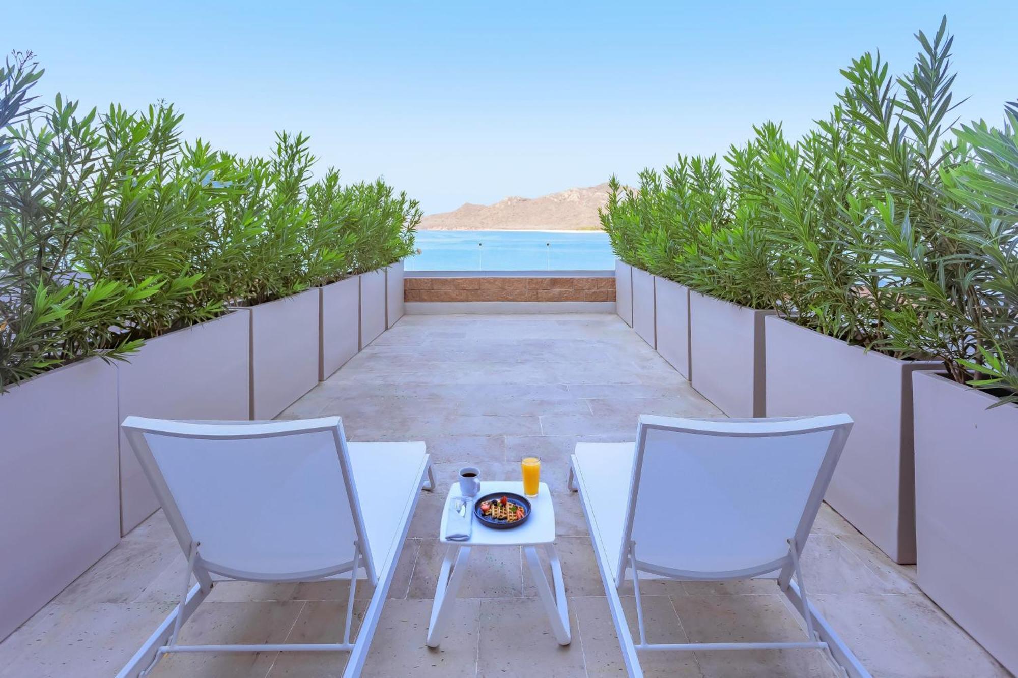 Deluxe Queen Room with Two Queen Beds, Terrace and Ocean View