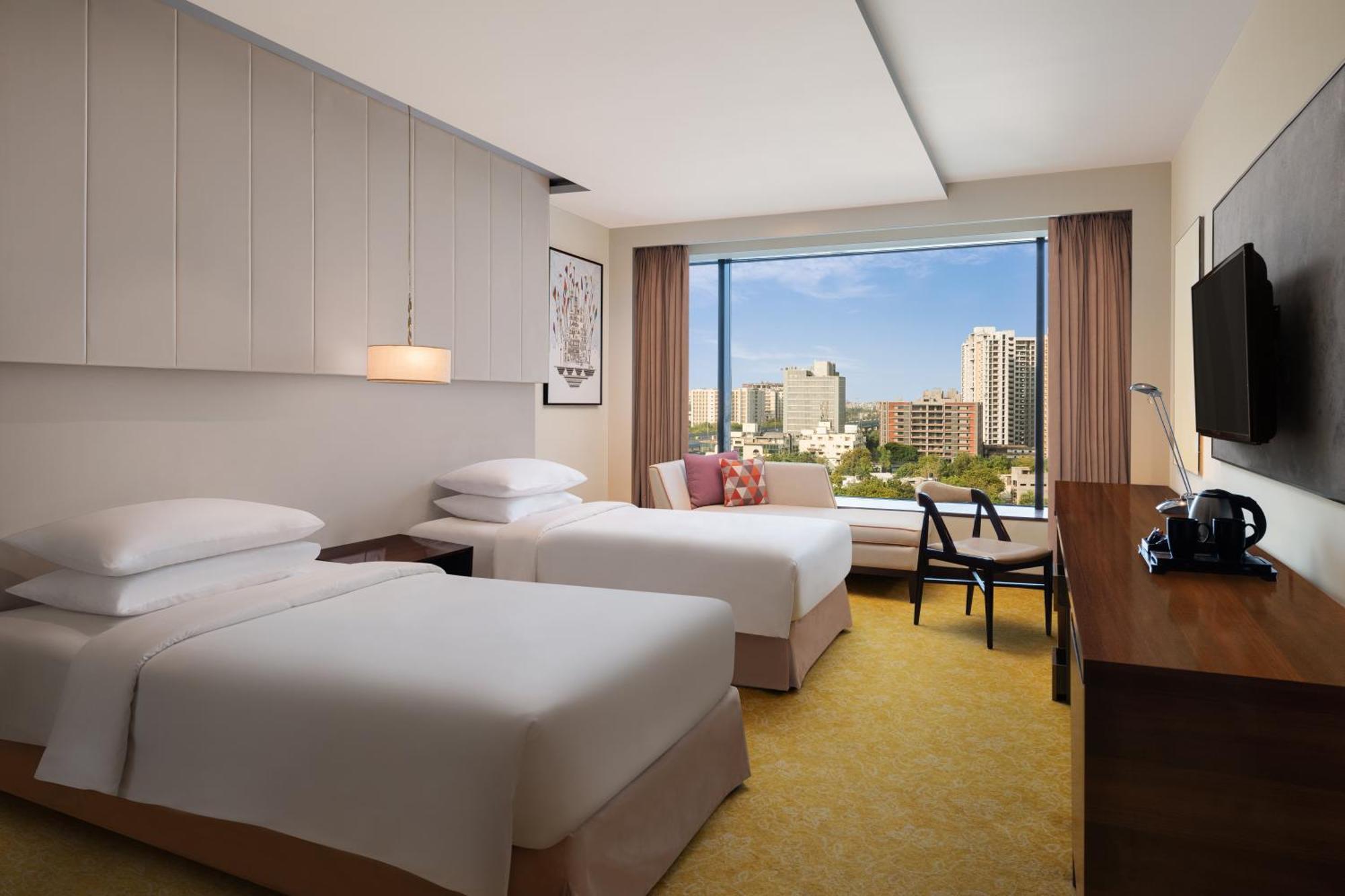 Executive Room 2 Twin or Single Bed Club benefits INR 500 meal credit per of Food & Beverages Laundry One way Airport Transfers need 4 hours prior request