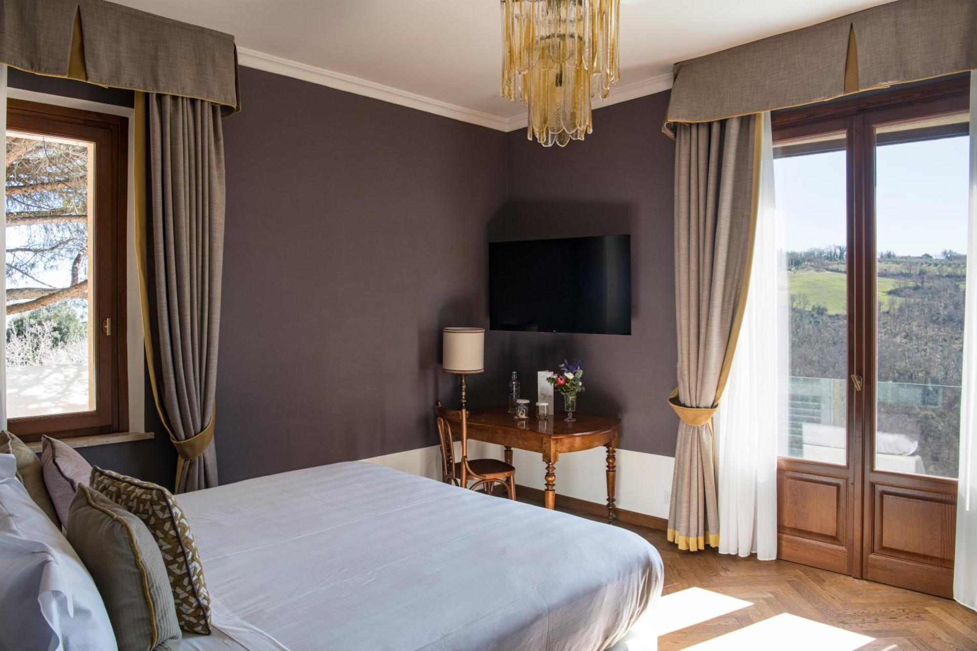 Kamer met Queensize Bed en Balkon