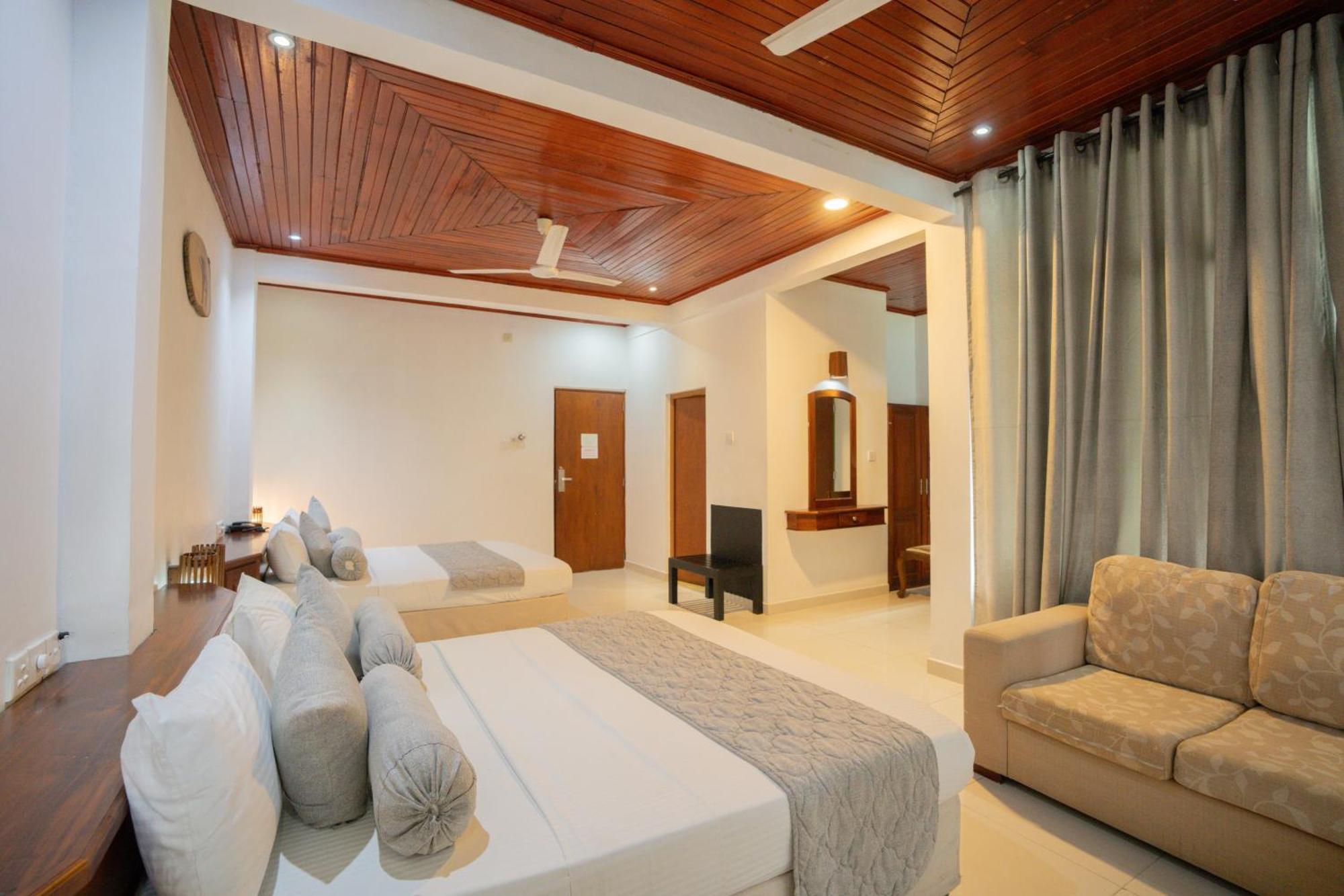 Deluxe Triple Room