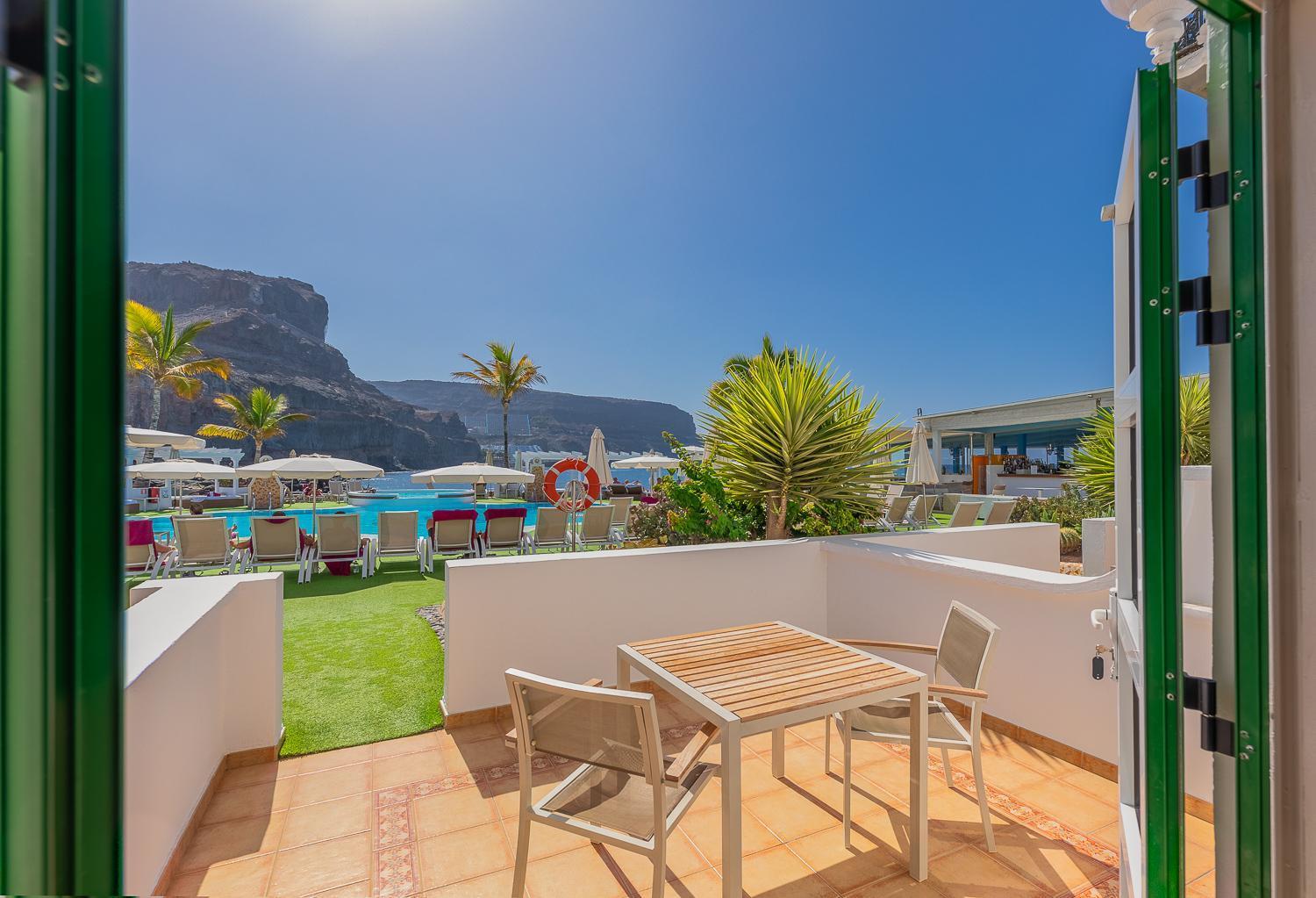 Double Room with Pool View and Terrace ( 2 Adults + 1 Child)
