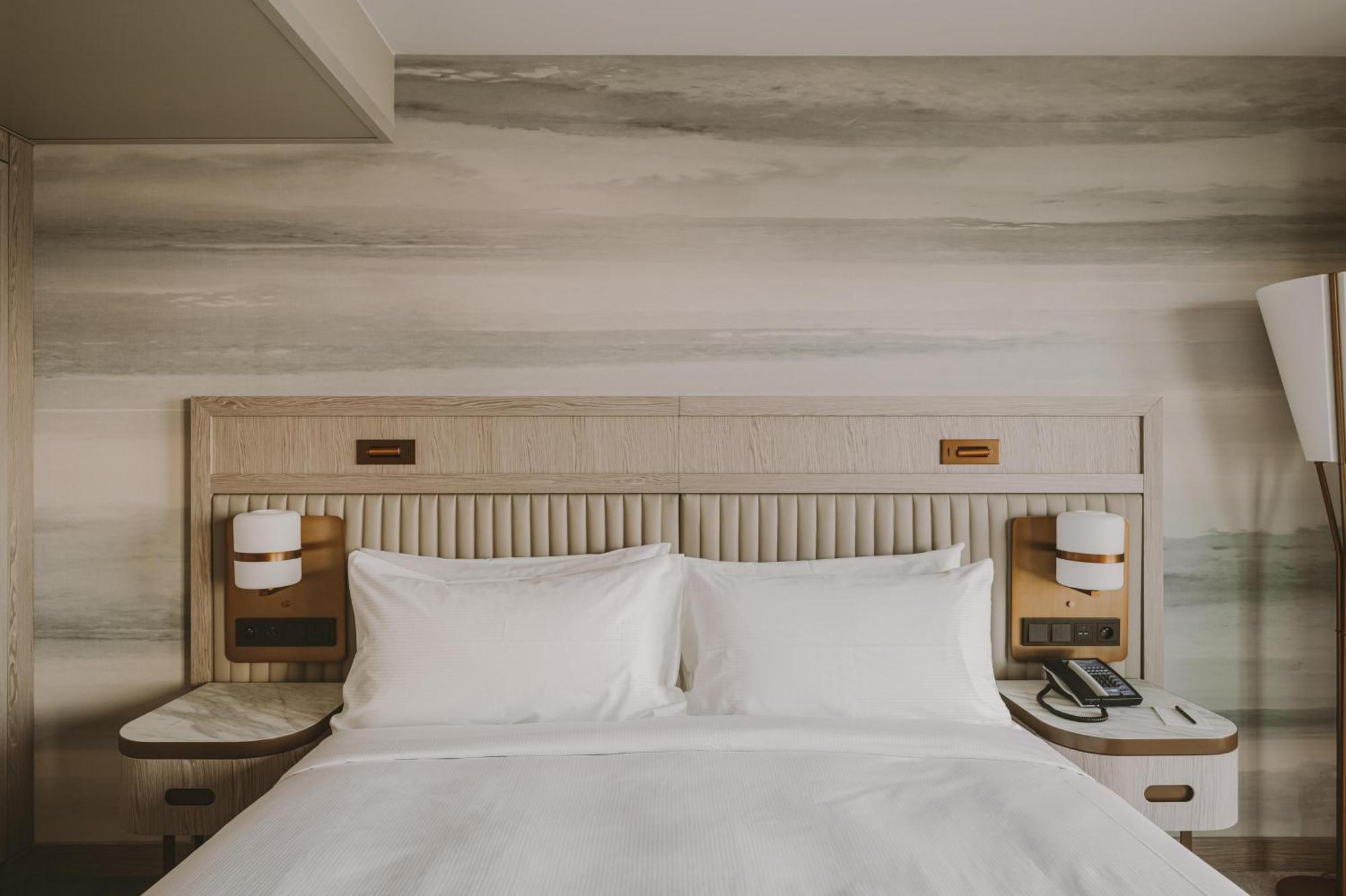 One-Bedroom King Suite with Side Sea View