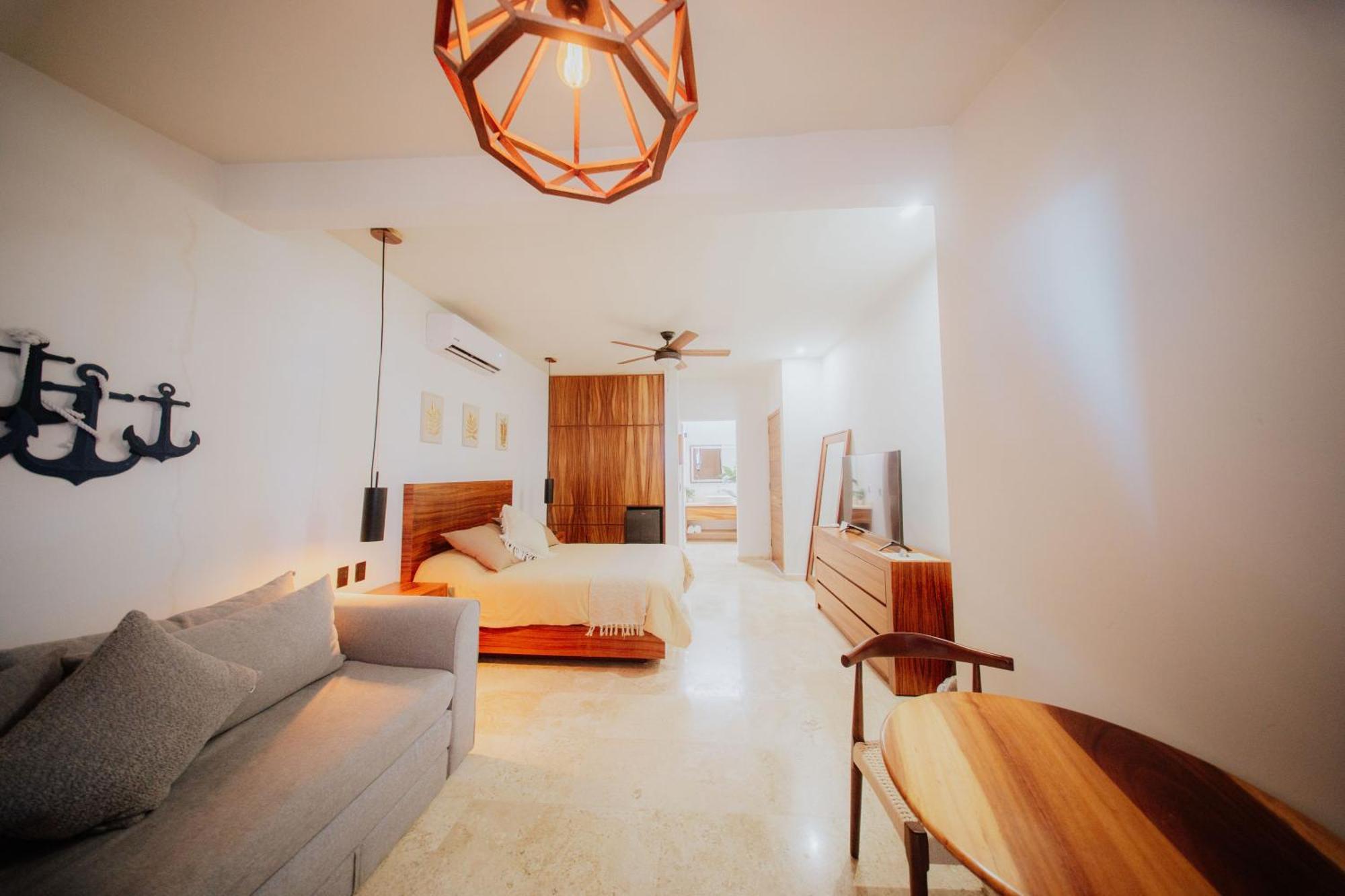 Habitación Doble Deluxe con balcón y vistas al mar
