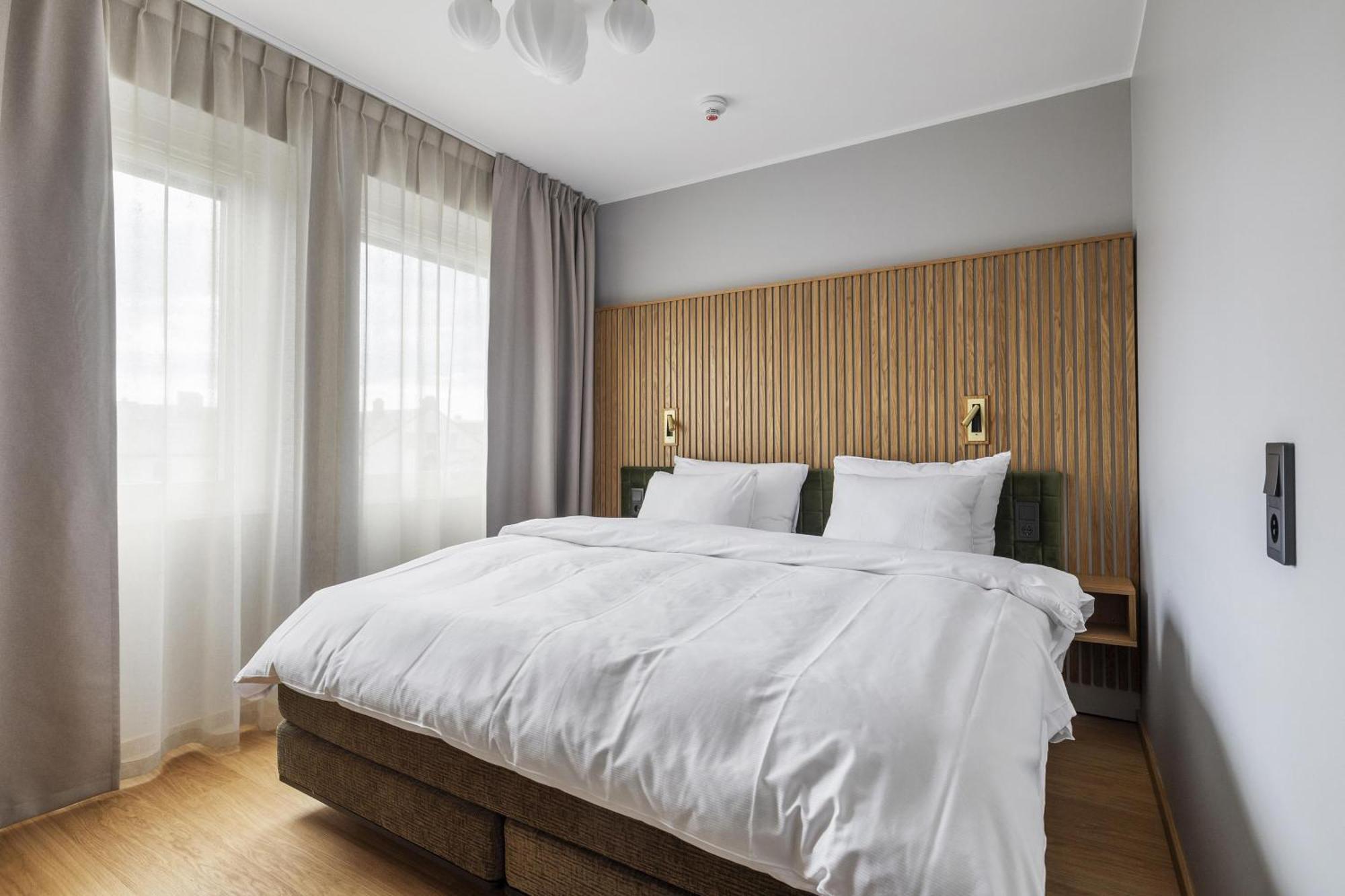 Family Room with One King Bed and One Wall Bed - Non-Smoking