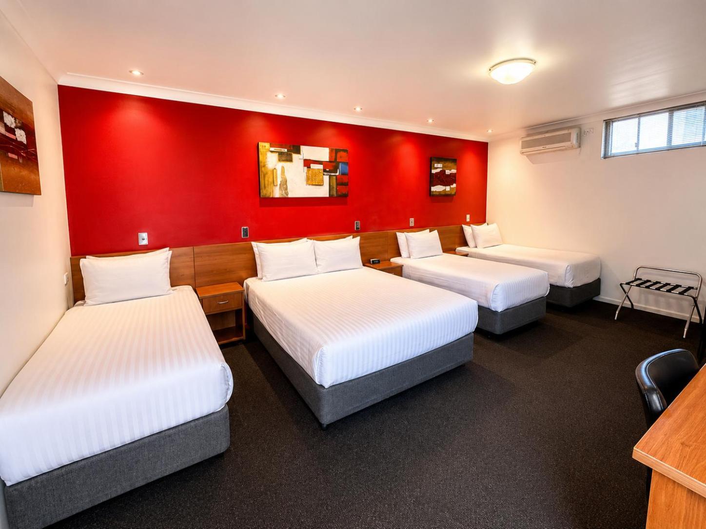 Family Room with a Queen Bed and Two Single Beds