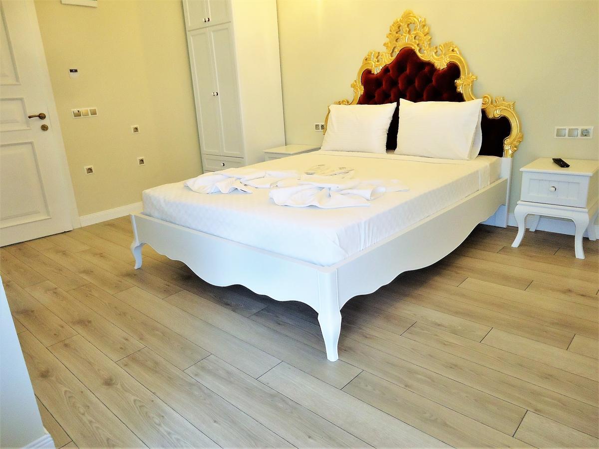 Deluxe Quadruple Room,662447838:JPEG