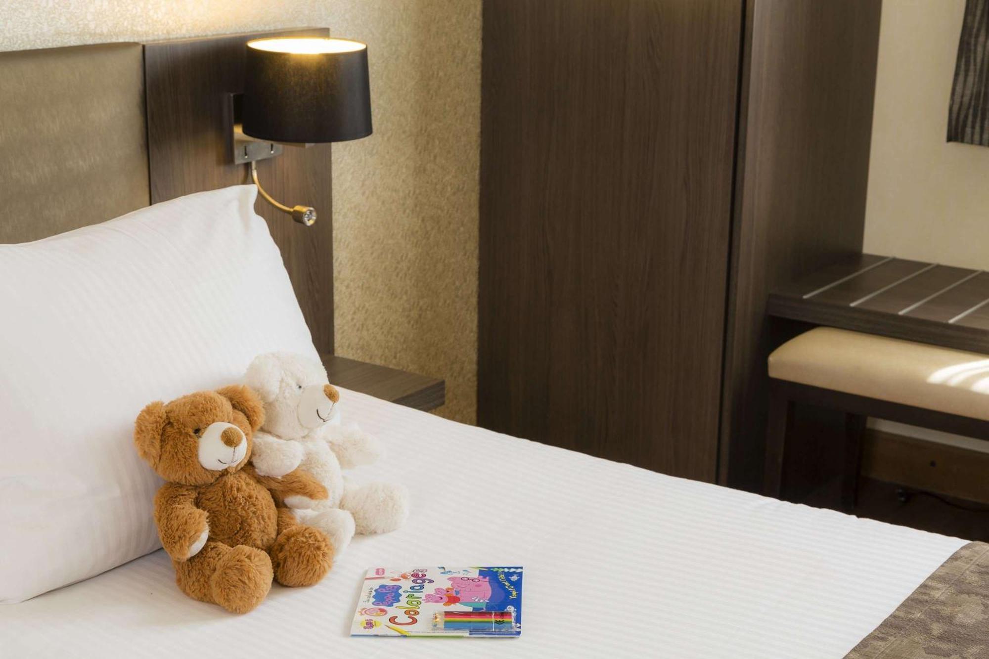 Family Queen Room with Two Single Beds