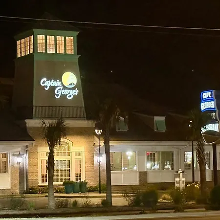New 2026-Ocean Sands Beach Boutique Inn-24Hr Sauna And Salt-Mineral Pool-Free Beach Bikes And Famous Beach-Fresh Baked Cookies-Popcorn-In Room Bathrobes-Sunscreen-65 Inch Tvsnetflix-Bedside Candy-Free Laundry- 4 Grand Black Beds-Call & Save-1-252-Aha-2