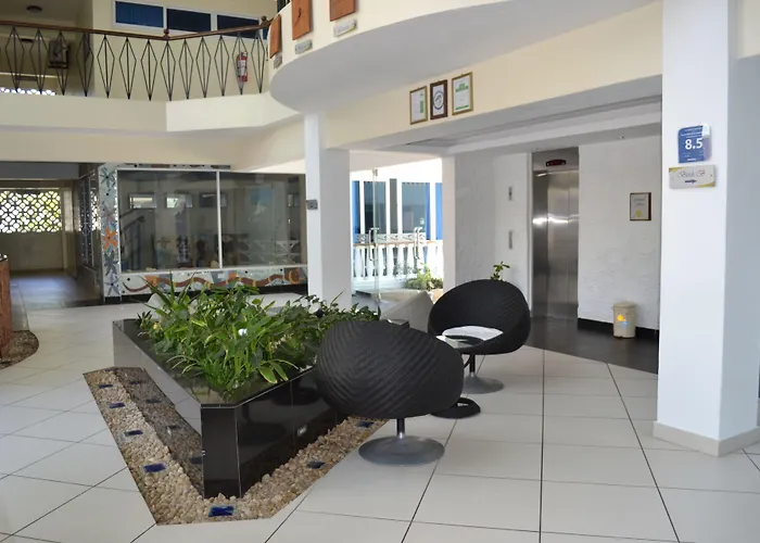 Cowrie Shell Beach Apartments Official